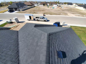 Top-down view of new roof completed after construction project in Twin Falls, ID.